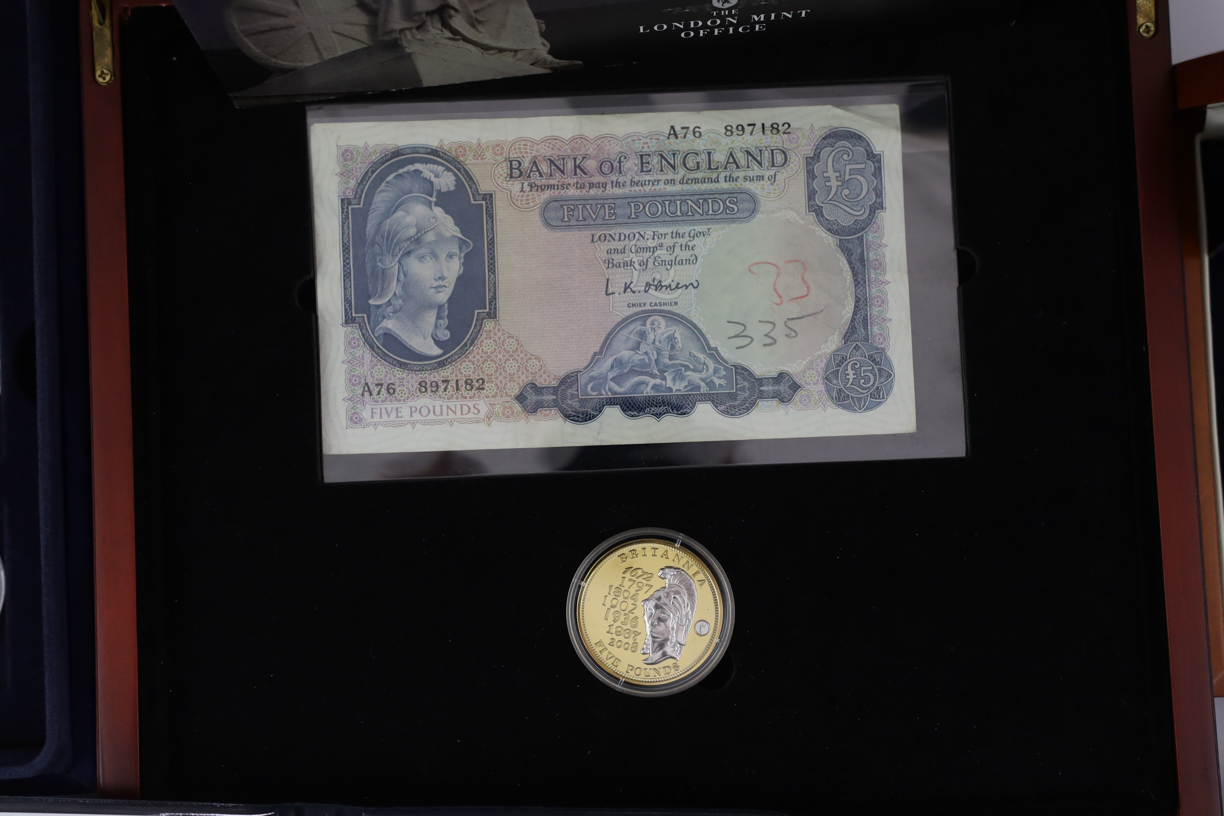 QEII coin issues - The London Mint office Britannia £5 coin and banknote tribute set, The 2008 & undated 20p coin set French, changing face of Britain’s coinage national emblems edition, Royal Mint 2012 Olympics 50p cycl